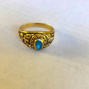 10K gold ring with turquoise center piece stone